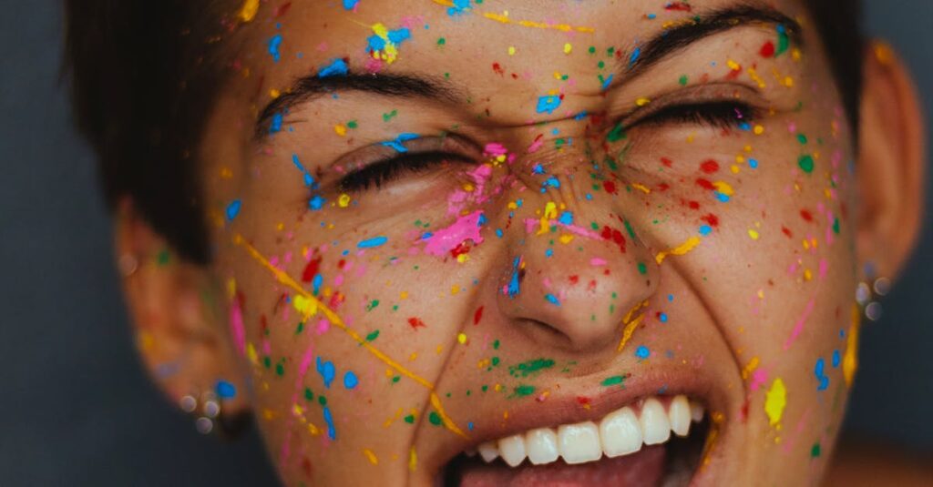 Woman's Face With Color Splatters