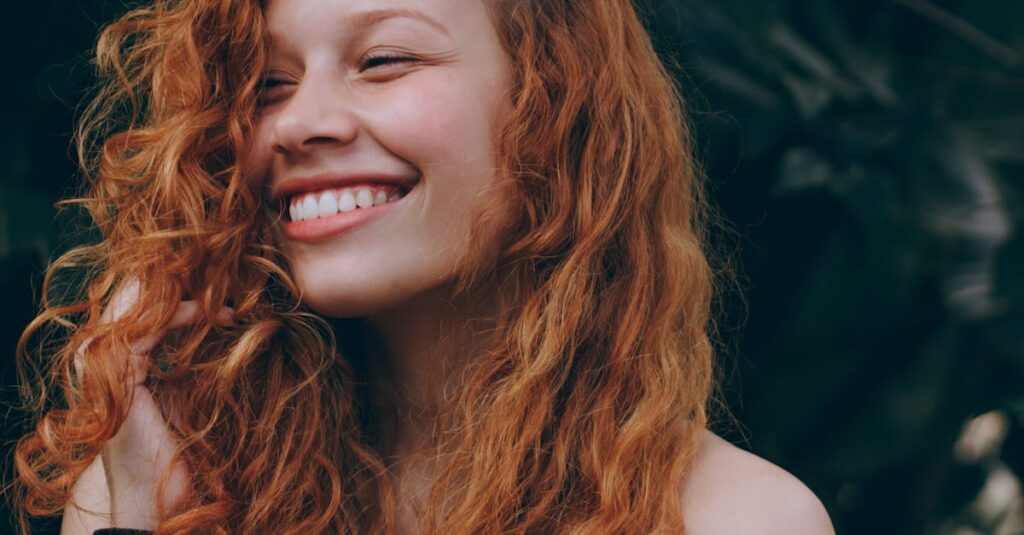 Smiling Woman With Red Hair